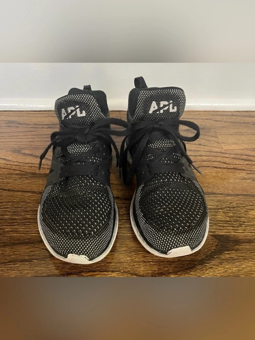 APL Ascends black and silver tennis shoes